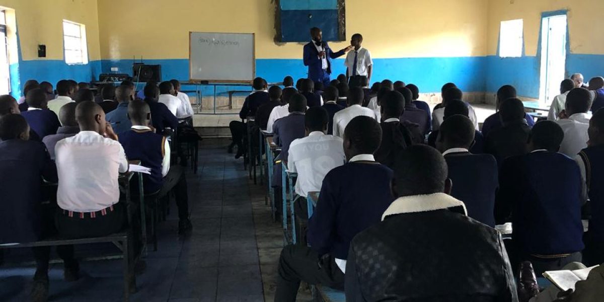 Students Listening to motivational speaker Mr. Sam Vidambu